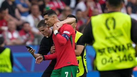 pitch government|Portugal manager expresses ‘concern’ after several fans invade .